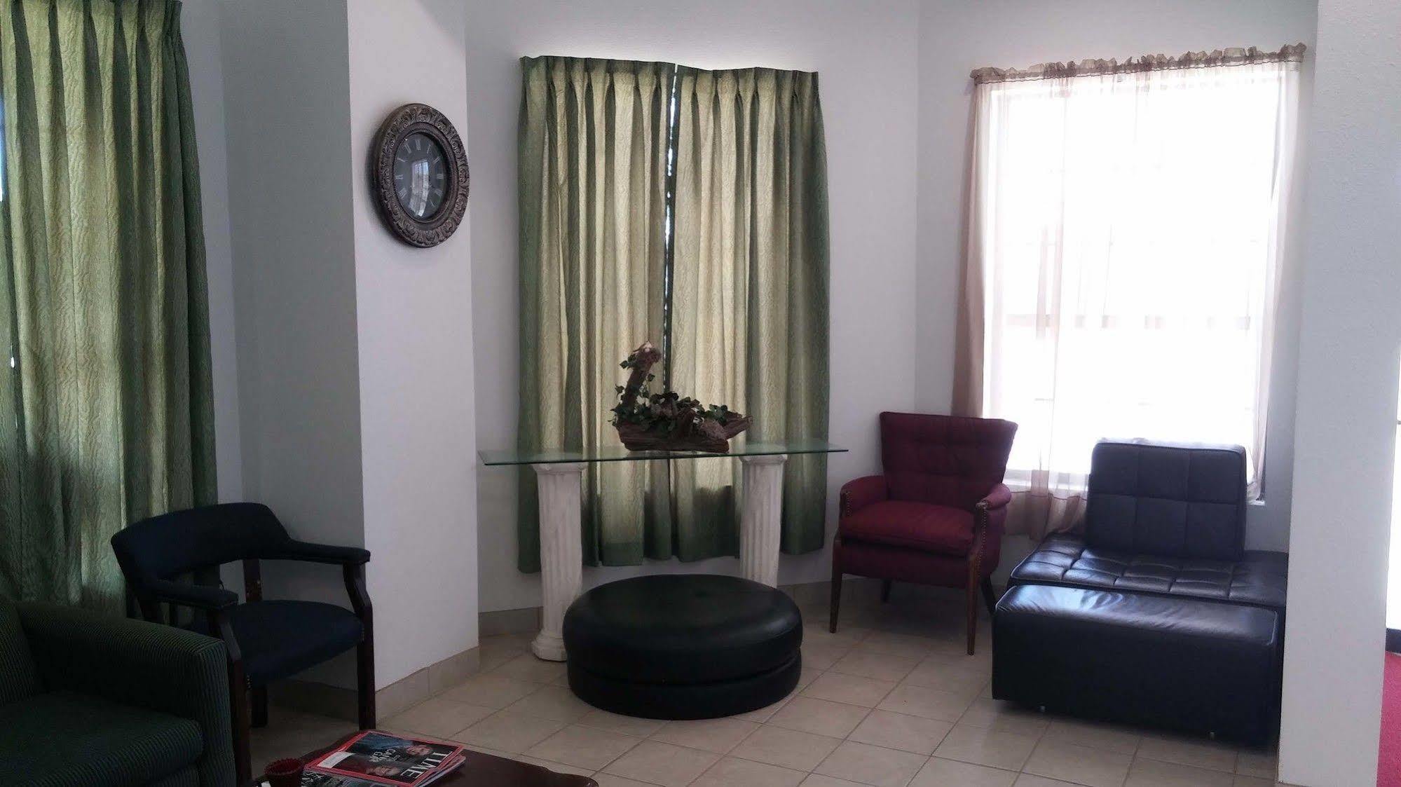 Country Regency Inn & Suites Manvel Dış mekan fotoğraf
