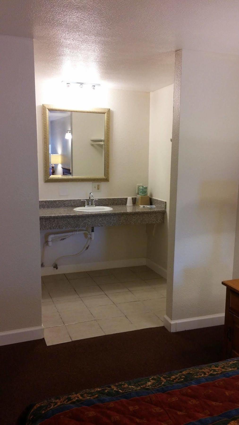 Country Regency Inn & Suites Manvel Dış mekan fotoğraf